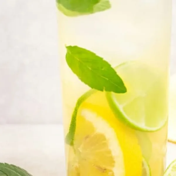 Chilled strawberry lemonade garnished with lemon wedge